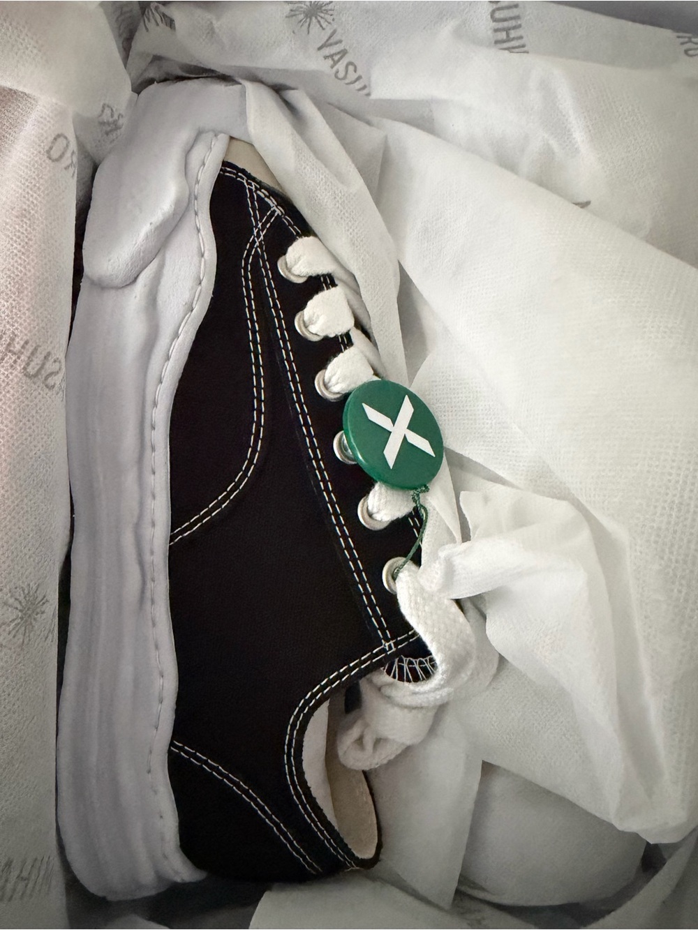 Men's Low-Top Canvas Sneaker in Black with White Trim